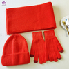 Knitting scarf + hat + gloves.